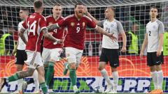 Martin helps Hungary edge past Estonia